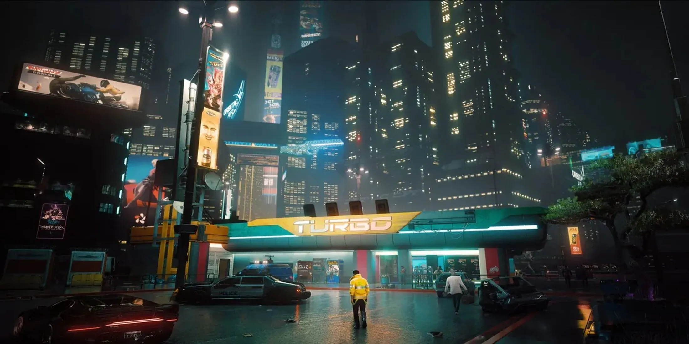 Khung cảnh Night City rực rỡ ánh đèn neon về đêm trong Cyberpunk 2077.