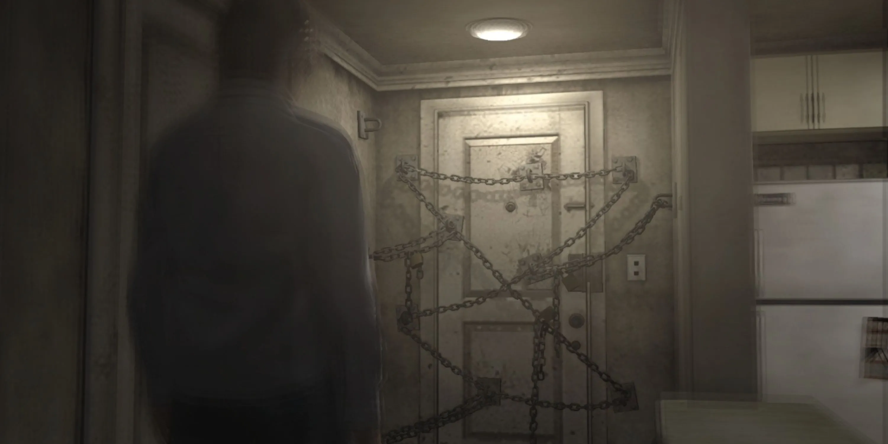 Bìa game Silent Hill 4 The Room với nhân vật chính đứng trước cửa phòng