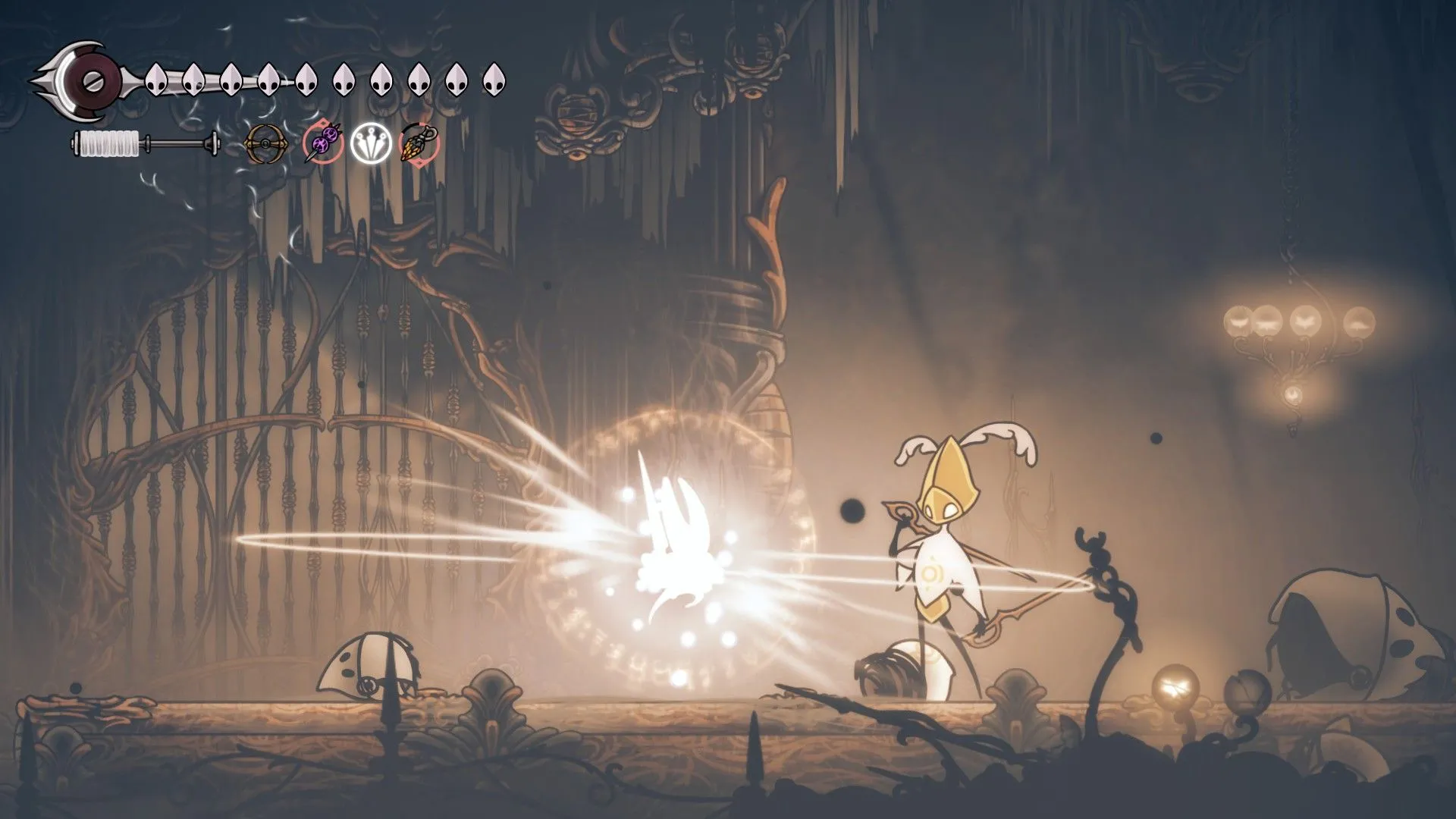 Sử dụng Injector Band để hồi máu trong Hollow Knight: Silksong